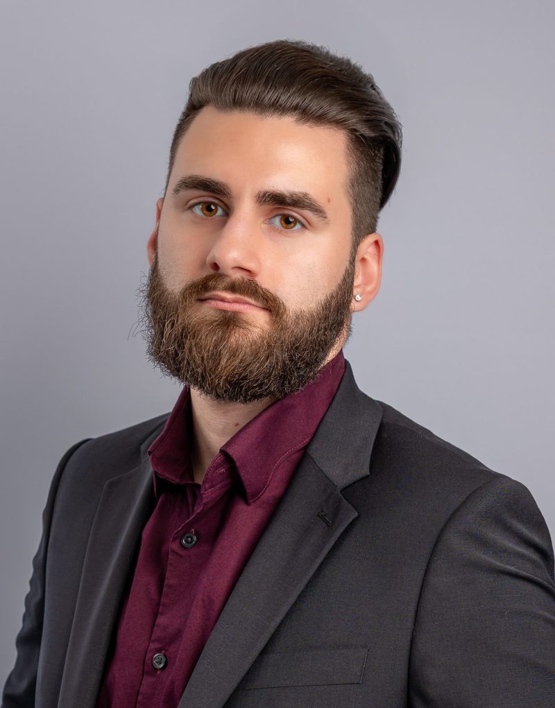 1753310692-Logan headshot