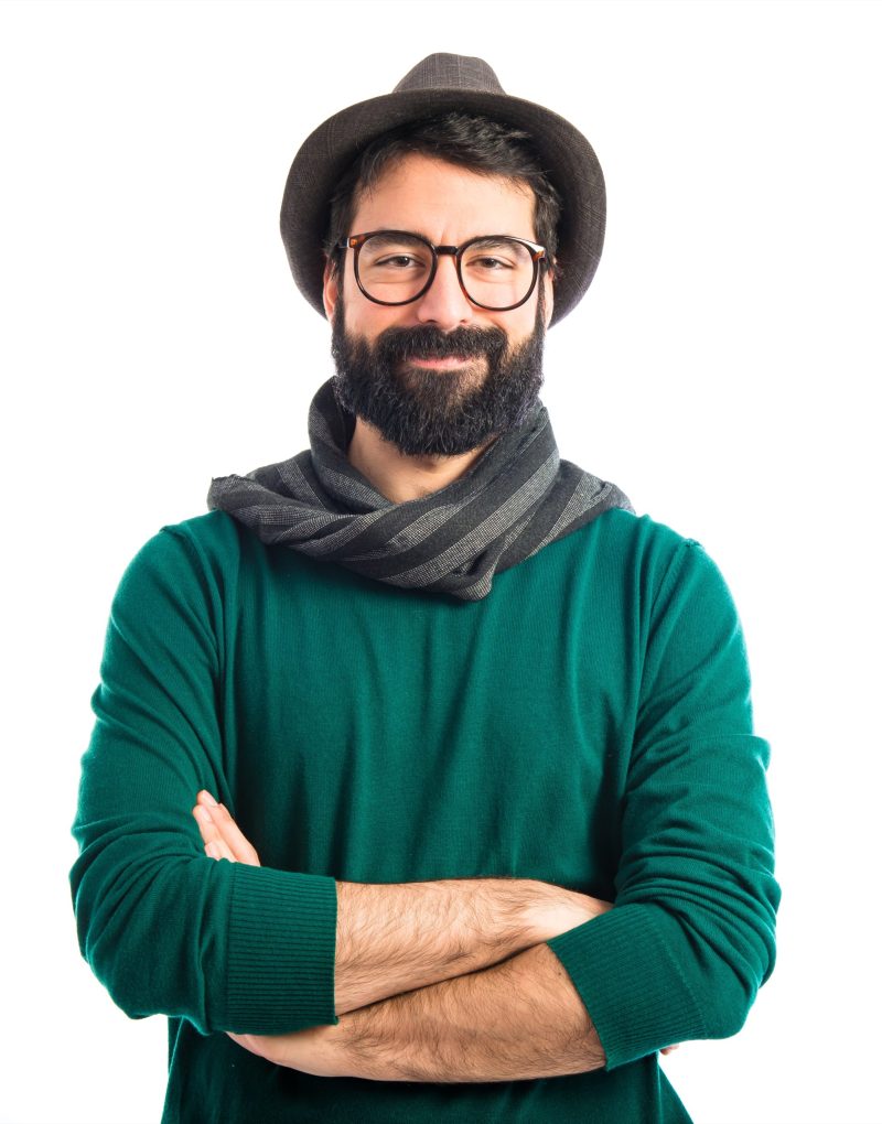 bohemian man with his arms crossed